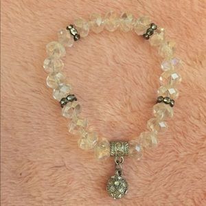 White Beaded Bracelet with Silver Pendant